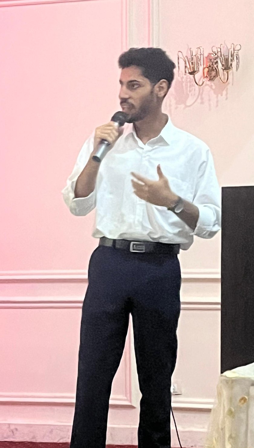 Mohab Gabber speaking at an event